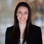 A professional wellness expert in business attire, representing the source of the nutritional guidance.