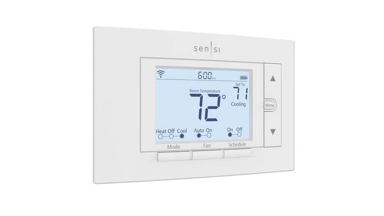 Sensi Smart Thermostat on a white wall showing a clear, backlit temperature display.
