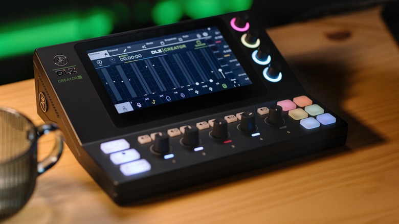 Mackie DLZ Creator XS audio mixer featuring its central touchscreen and compact fader layout.