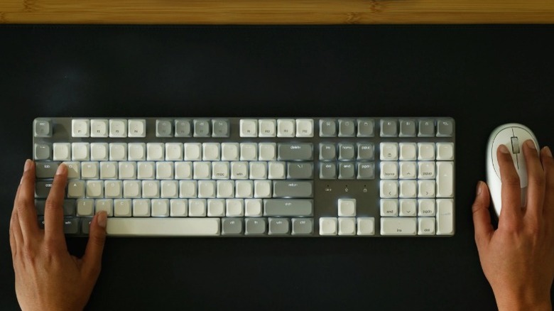 An overhead view of the Satechi SM3 mechanical keyboard on a desk.