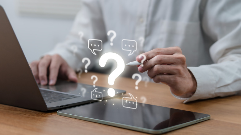 A digital illustration of a person managing floating question marks and notification boxes.