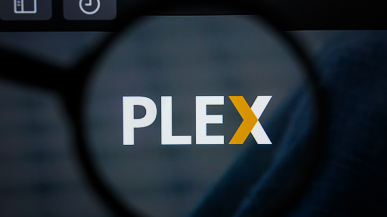 The Plex media server logo displayed prominently on a smart TV screen.